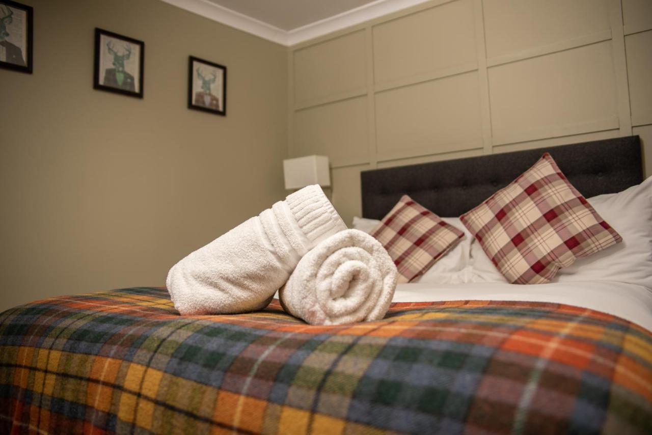 Hotel The Oak House à Axbridge Extérieur photo A bed with a duvet